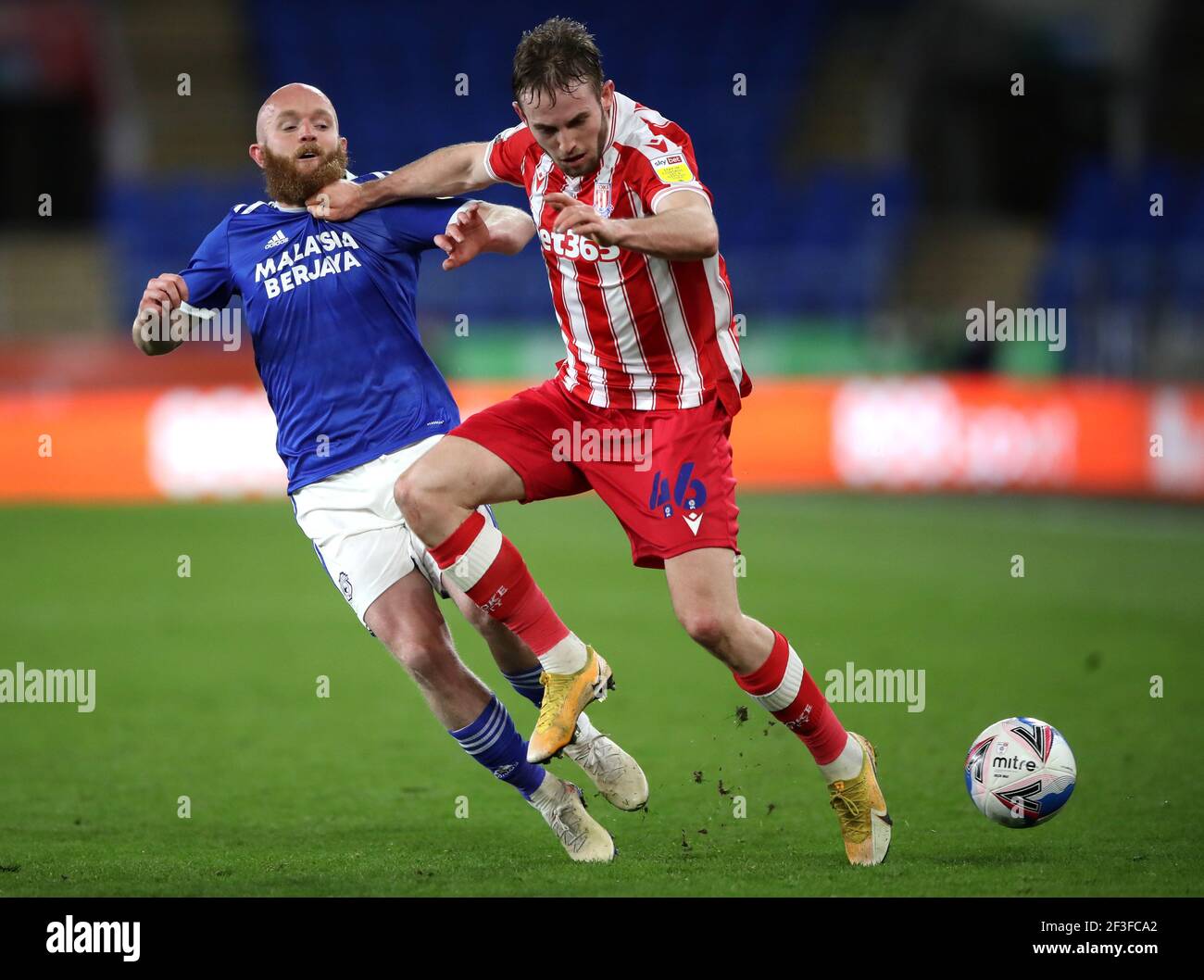 Cardiff City S Jonathan Williams Left And Stoke City S Rhys Norrington Davies Battle For The Ball During The Sky Bet Championship Match At Cardiff City Stadium Cardiff Picture Date Tuesday March 16 21 Stock