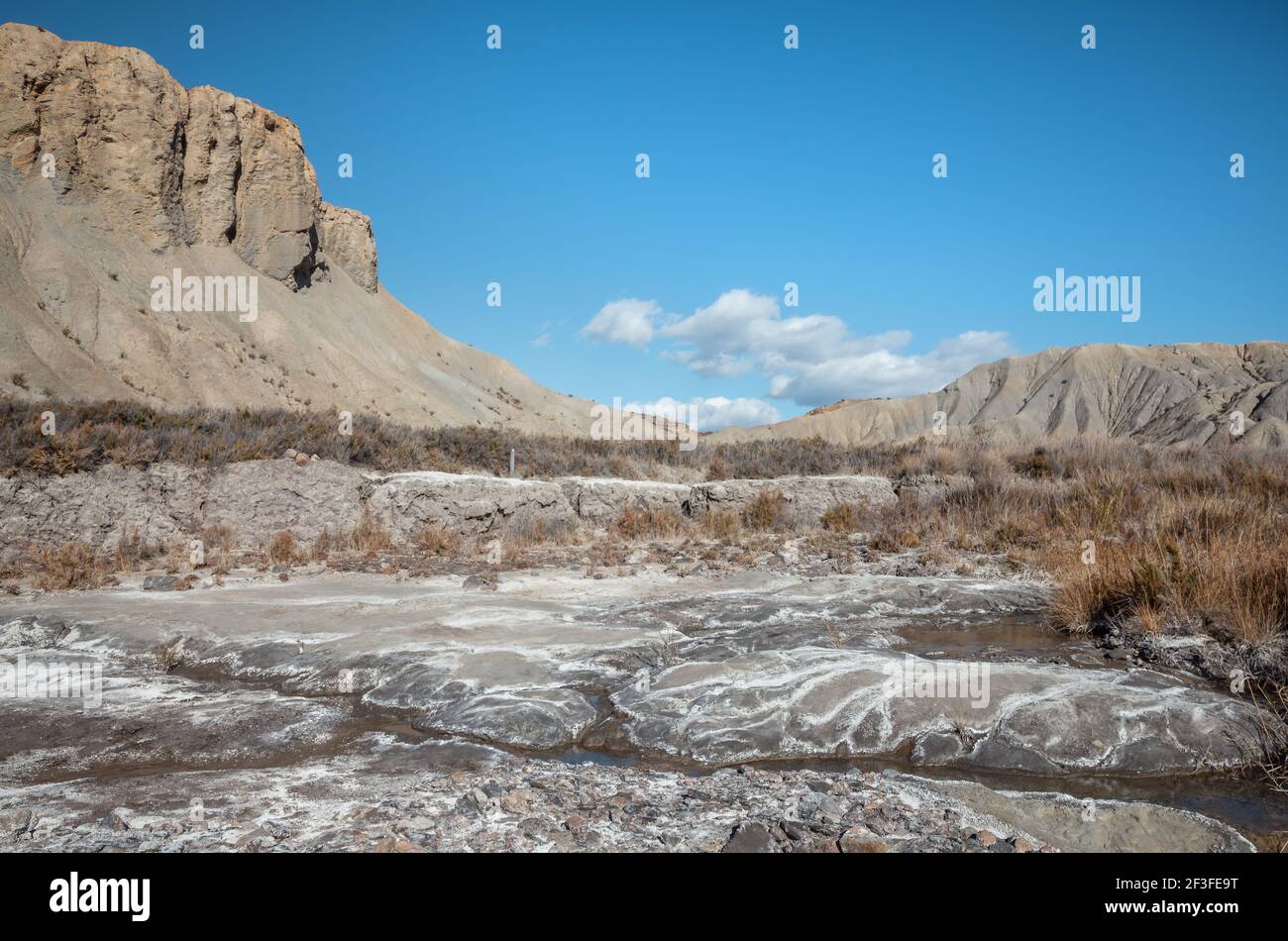 Salt covered soil of the dry river bed landscape in the Tabernas desert Almeria Spain Nature adventure Travel Europe Stock Photo