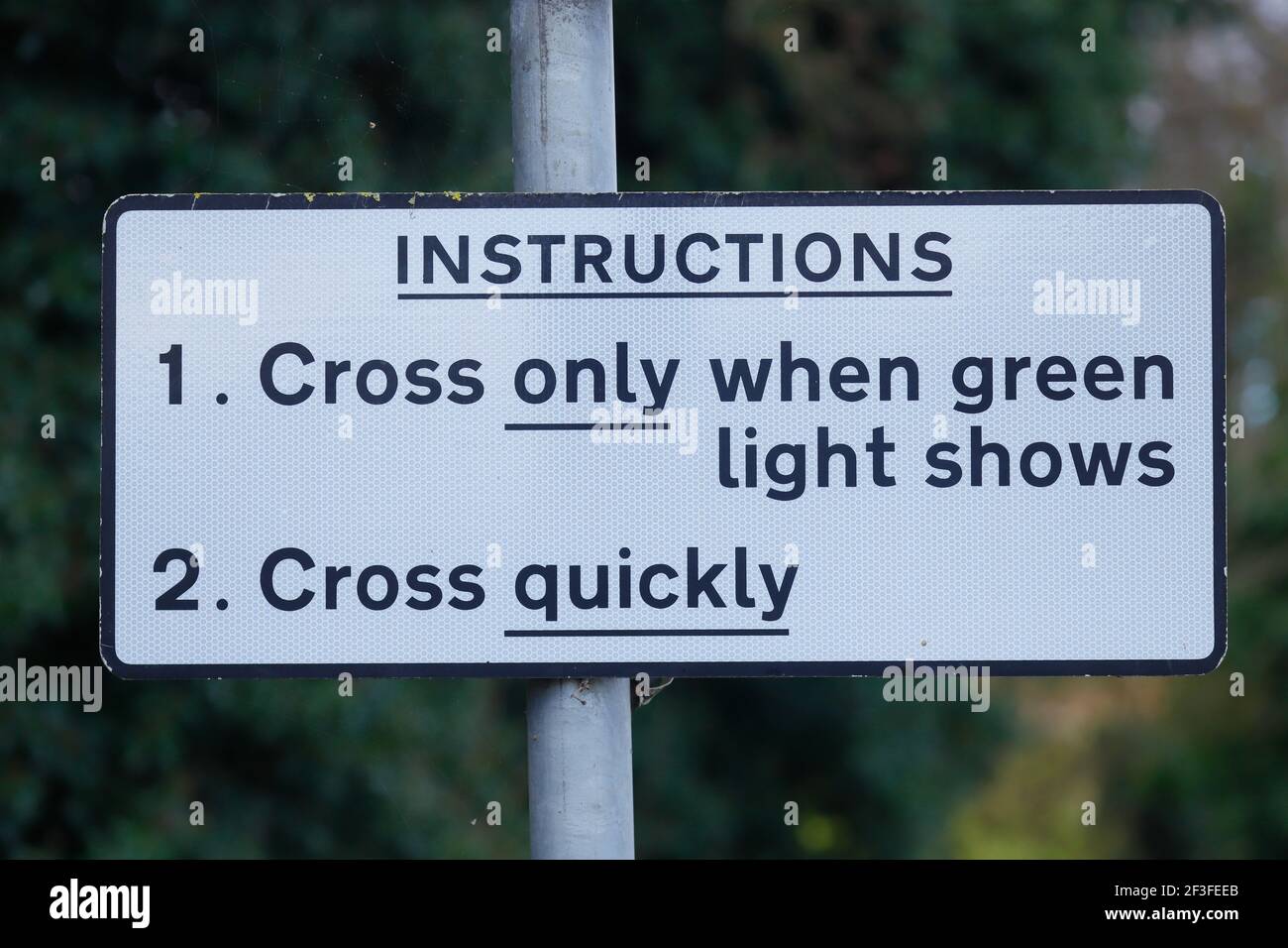 Instructions to pedestrians using a level crossing in Garforth Stock