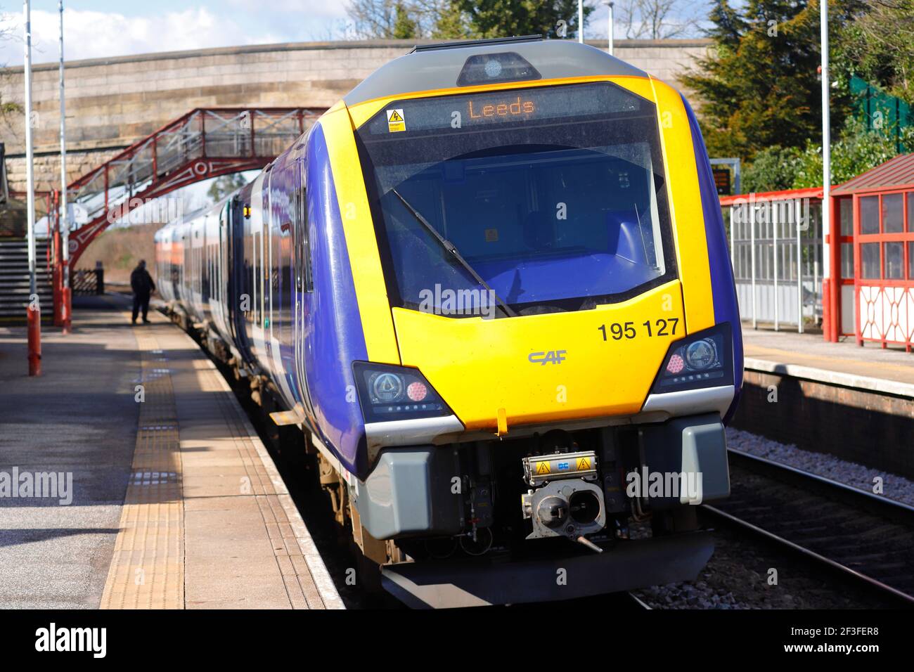 Rail Class 195 train by Northern Rail running through Garforth Station ...