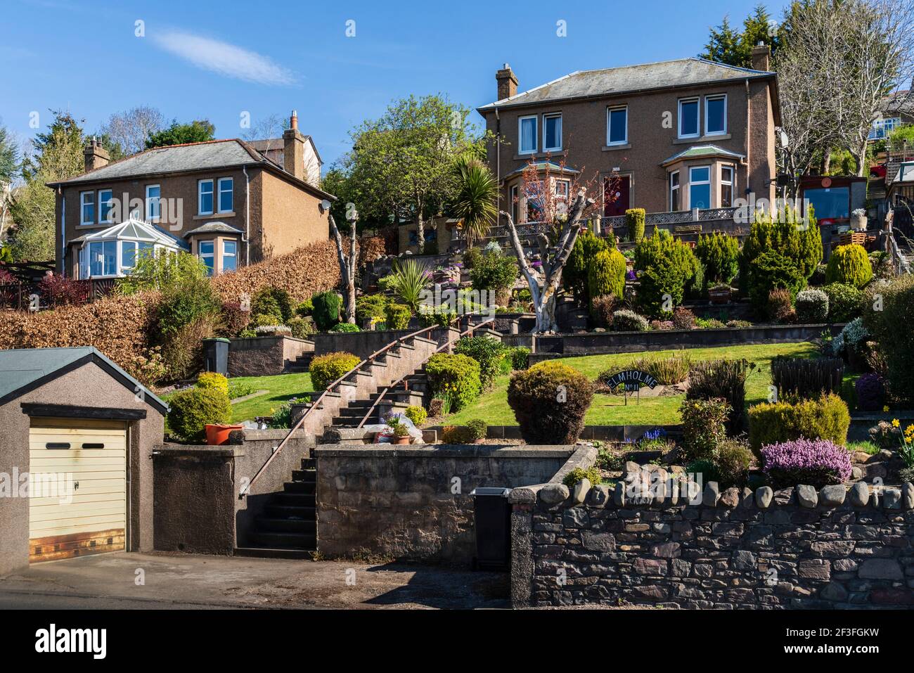 1930s detached houses in large gardens in Galashiels town, Scottish