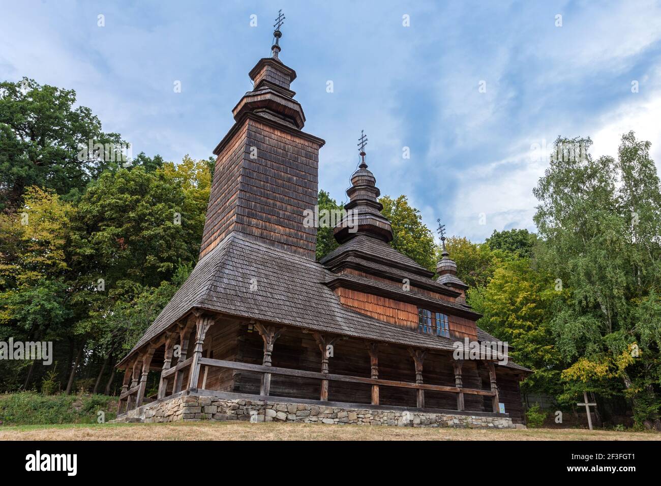 An old wooden church from Western Ukraine in the Kiev Pirogovo Museum of Architecture. Stock Photo