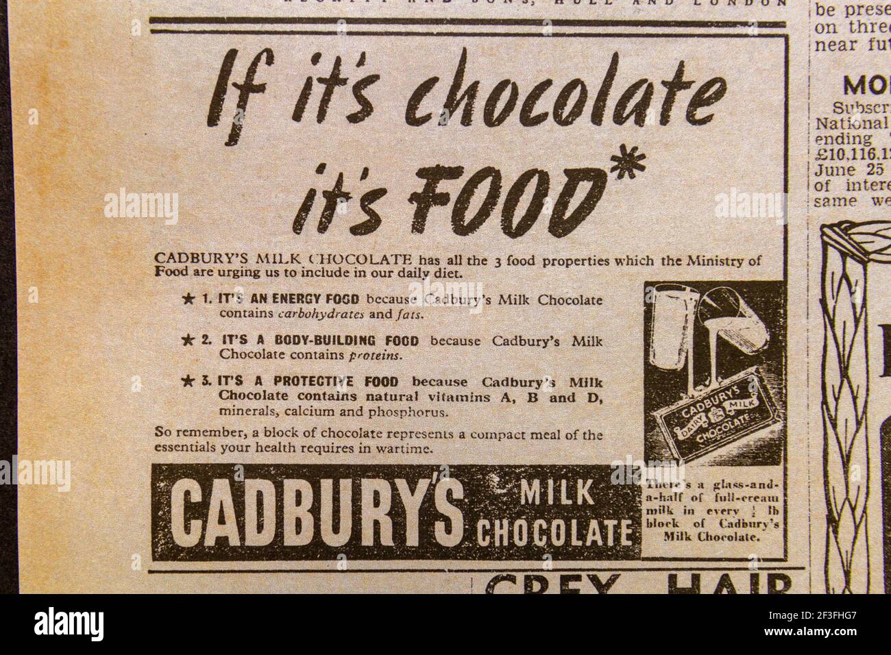 Advert for Cadbury's milk chocolate ('If its chocolate its food)' in the Daily Sketch newspaper (replica), 29th August 1940 (during the Blitz). Stock Photo