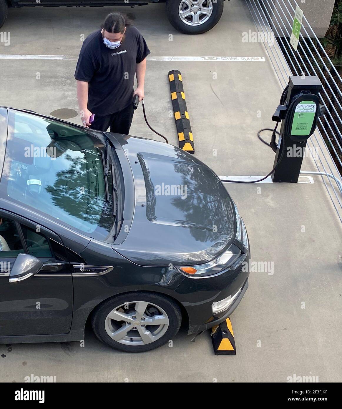 Atlanta, USA. 12th Mar, 2021. A motorist recharges his