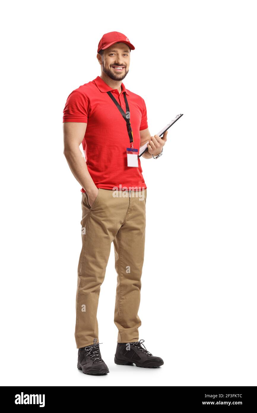 Full length portrait of a male shop assistant holding a clipboard and smiling isolated on white background Stock Photo