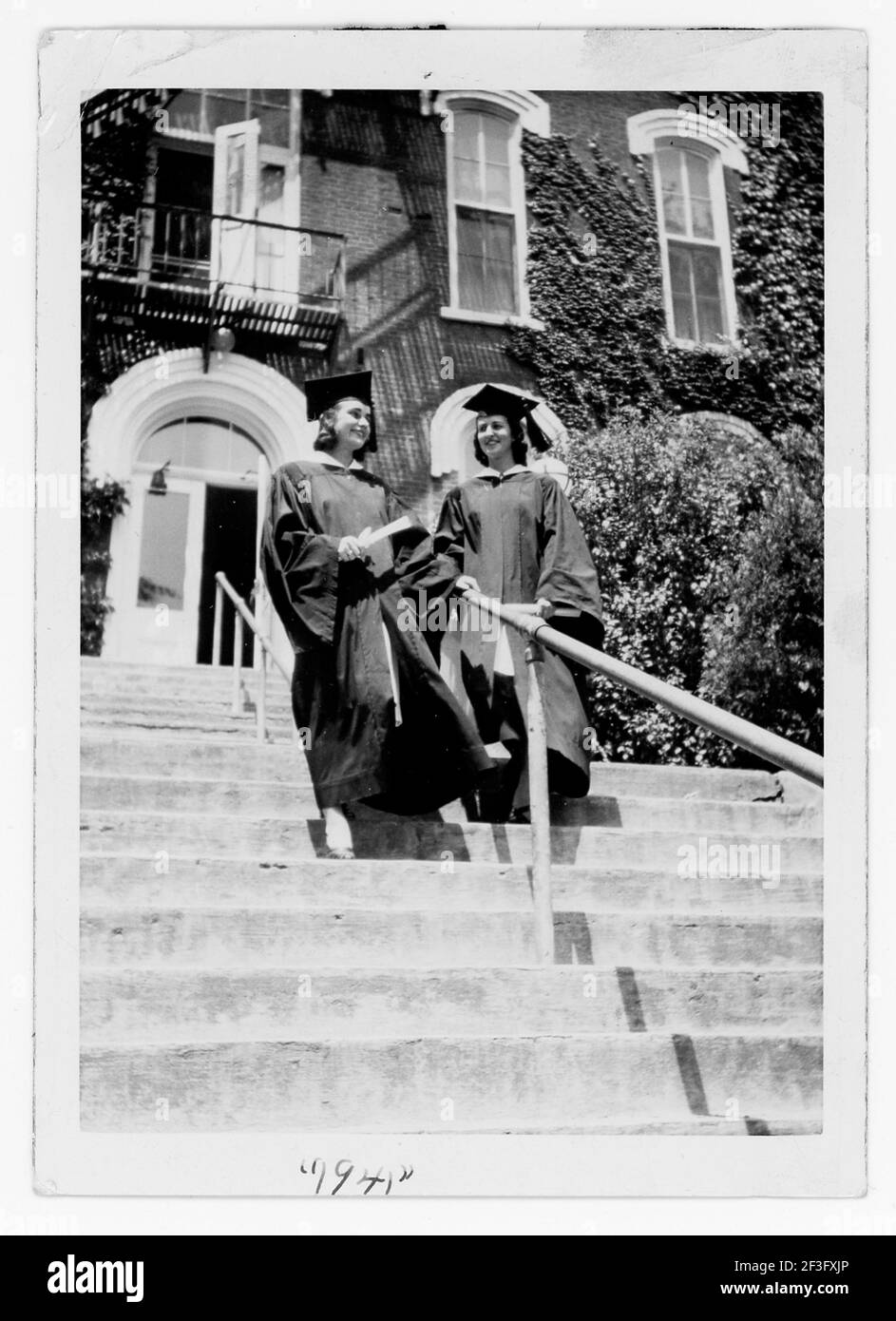 Two Young Women Graduates in Cap and Gown, 1941, PA. USA Stock Photo