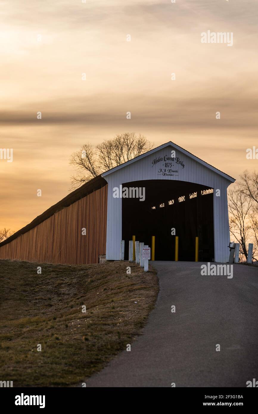 The East end of the Medora Covered bridge in Jackson County, IN looking west a few minutes before sunset on an overcast March afternoon. Stock Photo