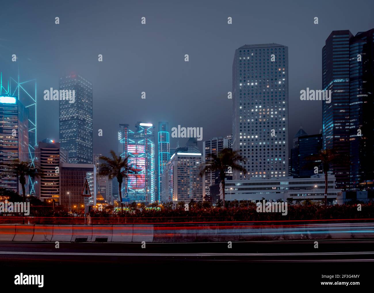 Modern office buildings in Hong Kong at foggy night Stock Photo - Alamy