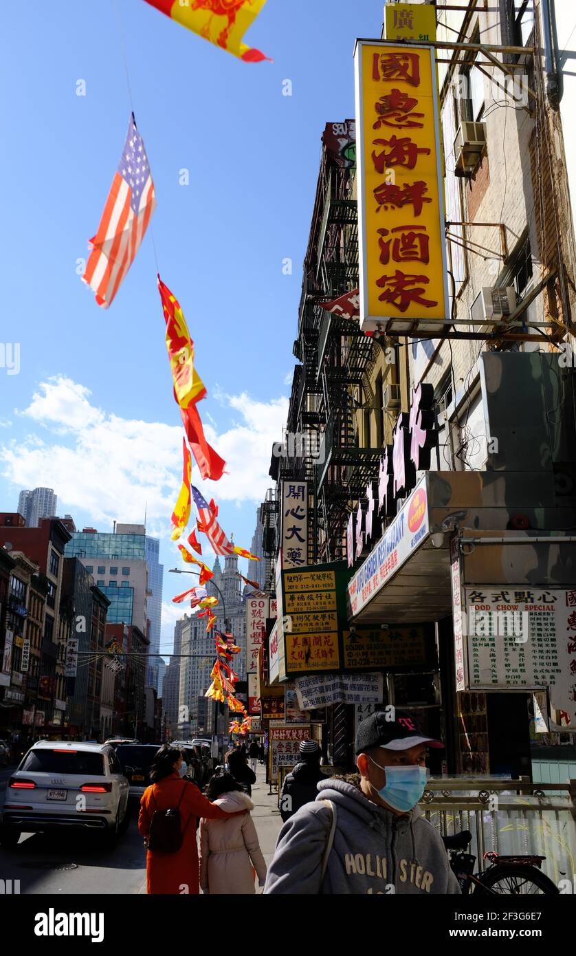 Businesses with signs in Chinese along East Broadway.Lower East Side.Manhattan.New York City.USA Stock Photo