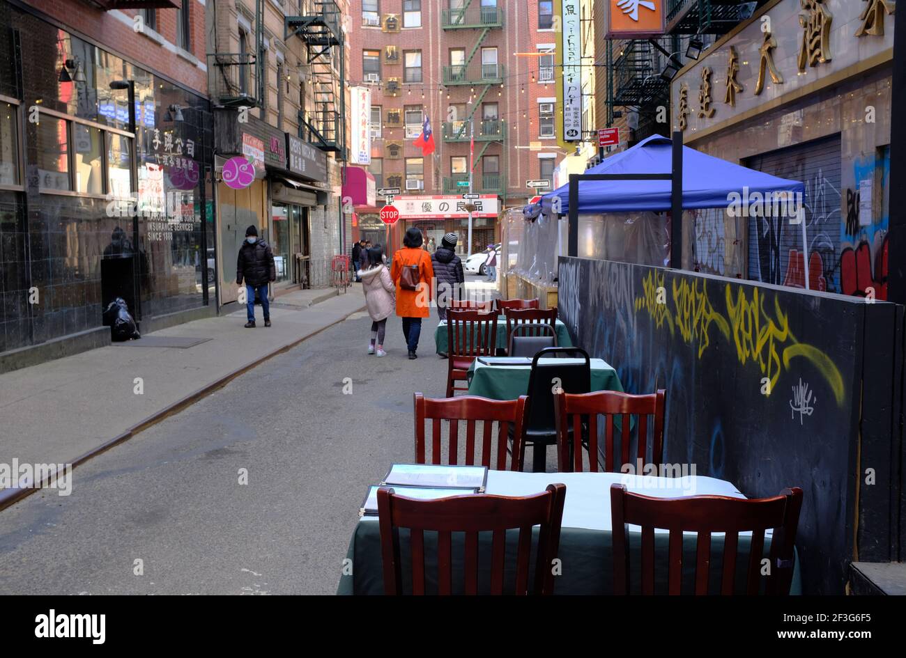 Outdoor dining seating on Pell street in Manhattan Chinatown.New York