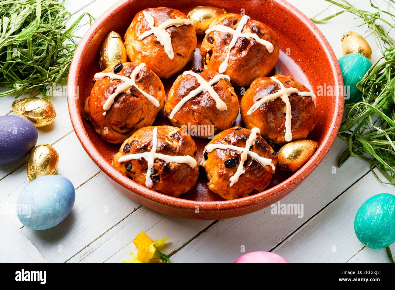 Easter hot cross buns and easter decor.Easter baked goods Stock Photo