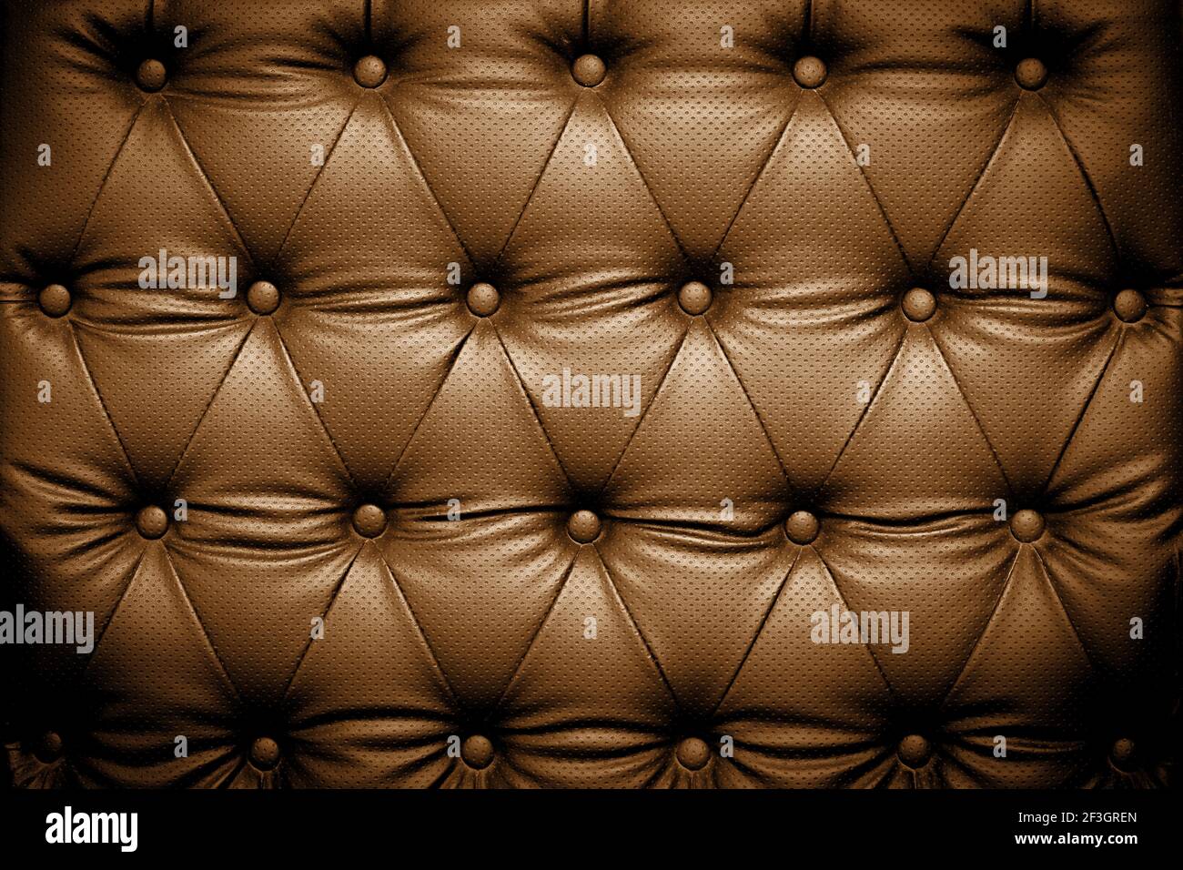 Dark brown leather texture with buttoned pattern Stock Photo