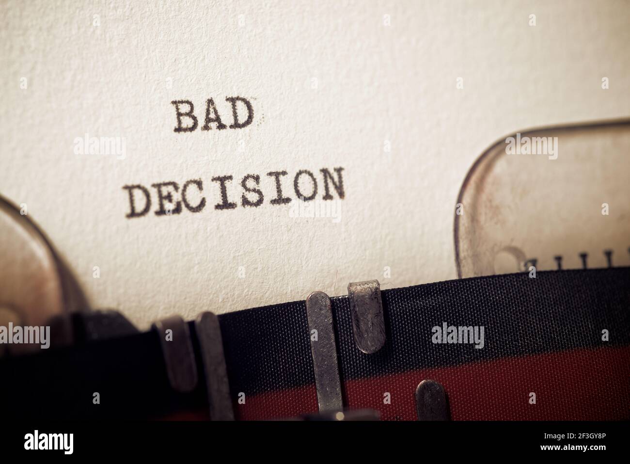 Bad decision phrase written with a typewriter. Stock Photo
