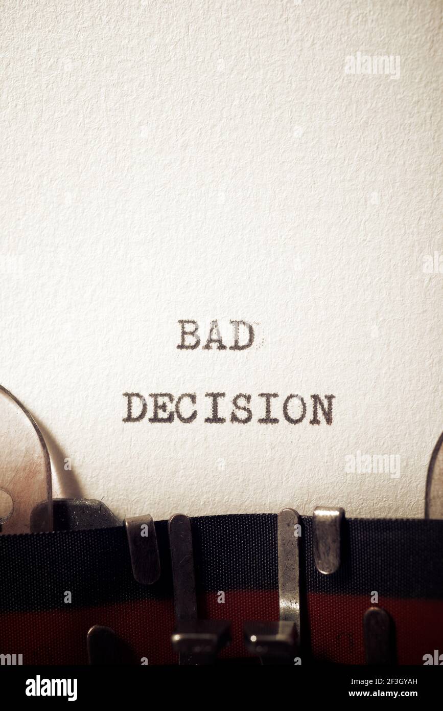 Bad decision  phrase written with a typewriter. Stock Photo