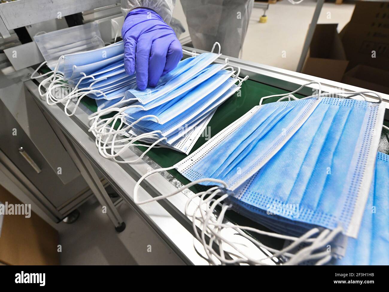 Mask production hi-res stock photography and images - Alamy