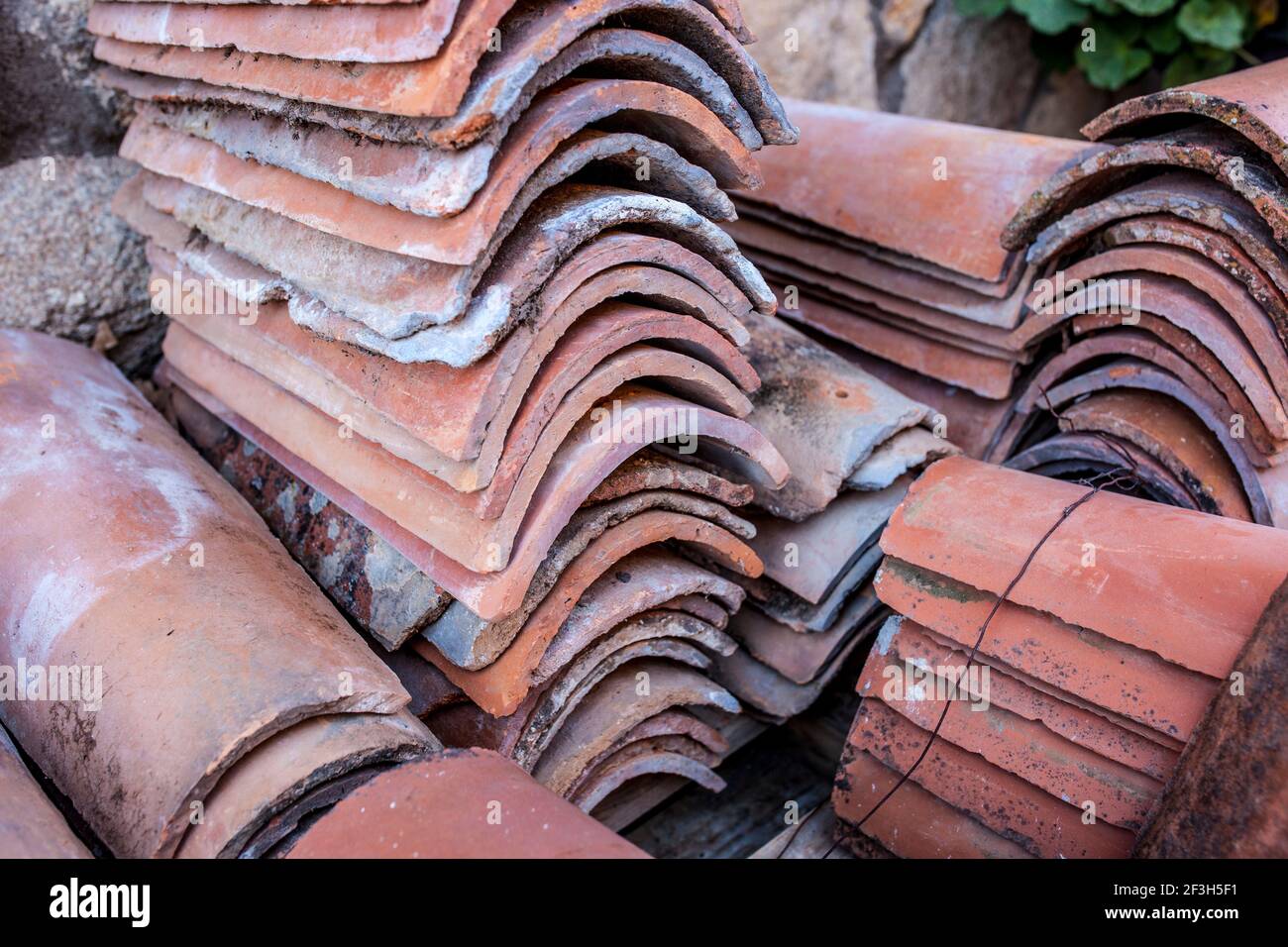 Packs of reused mediterranean roof tiles or monk and nun. Building