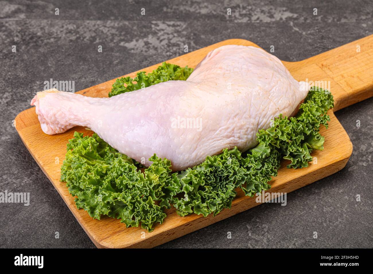 Raw uncooked chicken leg for cooking Stock Photo Alamy