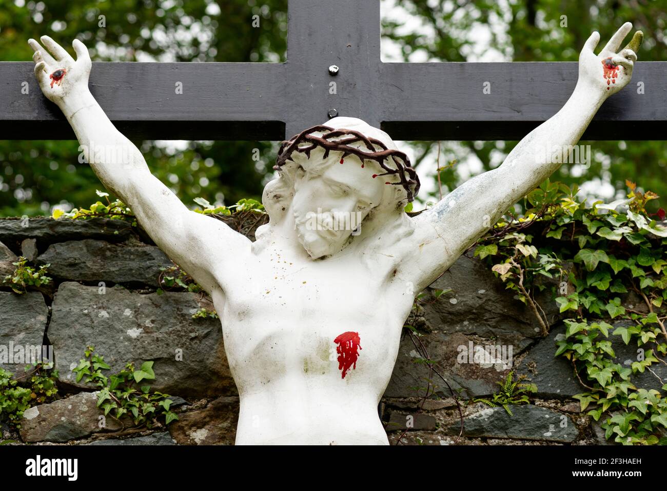 Statue crucifixion christ in church hires stock photography and images