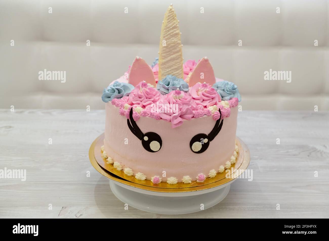 birthday cake in the form of a multi colored unicorn. Sweet cute ...