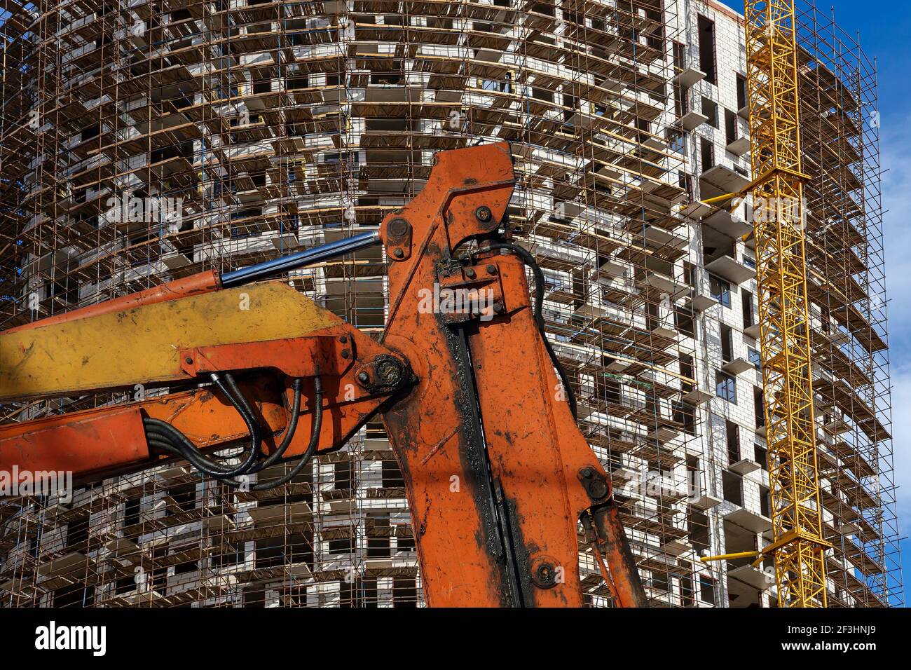 Part of a construction machine (excavator or crane) with multi-storey ...