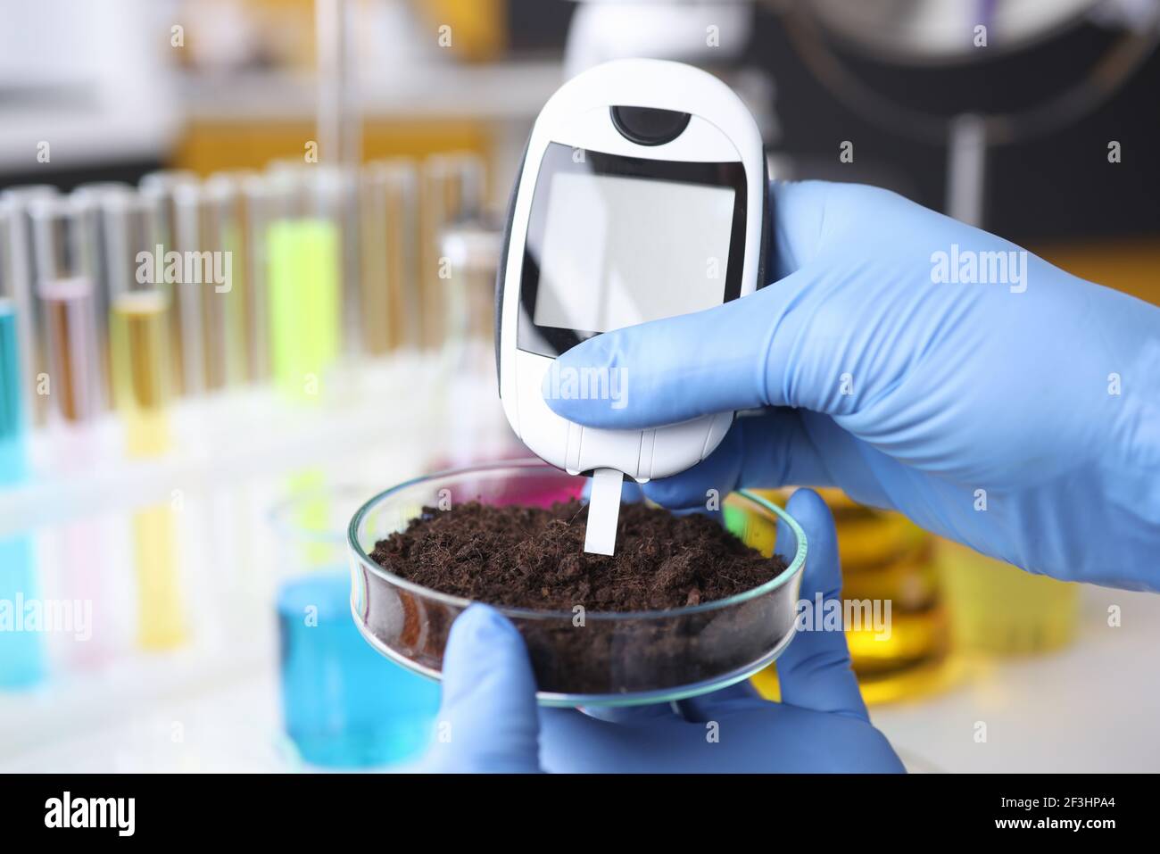 Ph test measures soil hi-res stock photography and images - Alamy