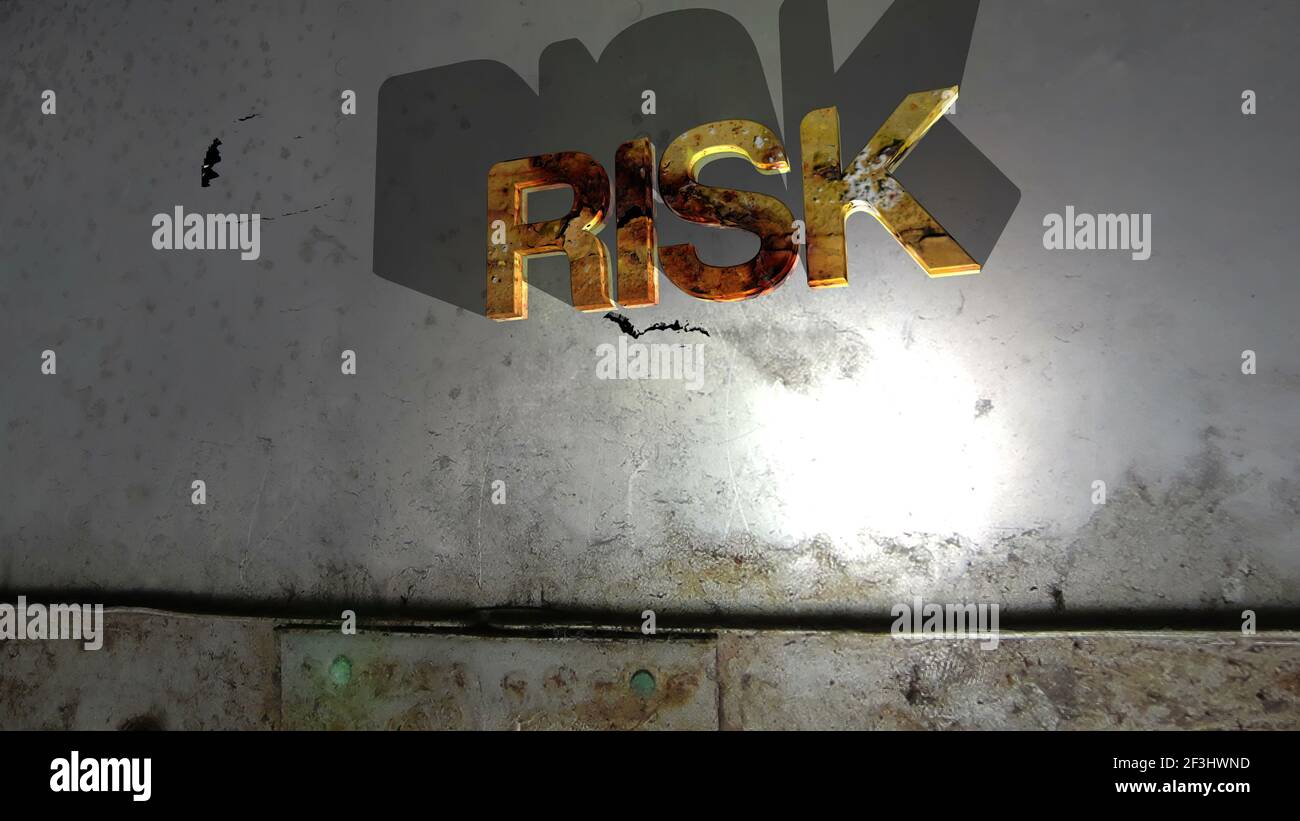 Risk text on the wall Stock Photo - Alamy