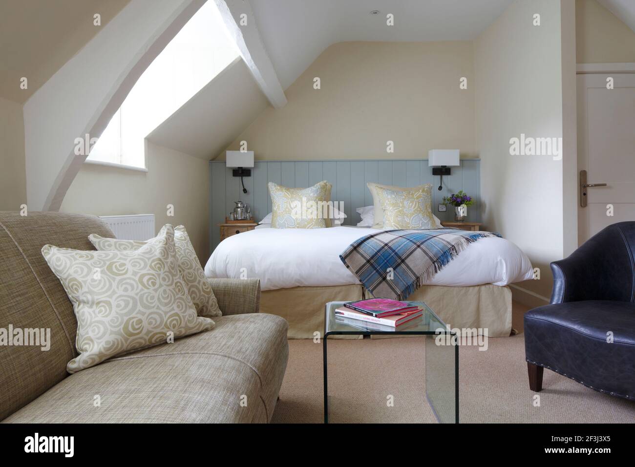 Bedroom with sitting area (lights off) | NONE | Stock Photo - Alamy