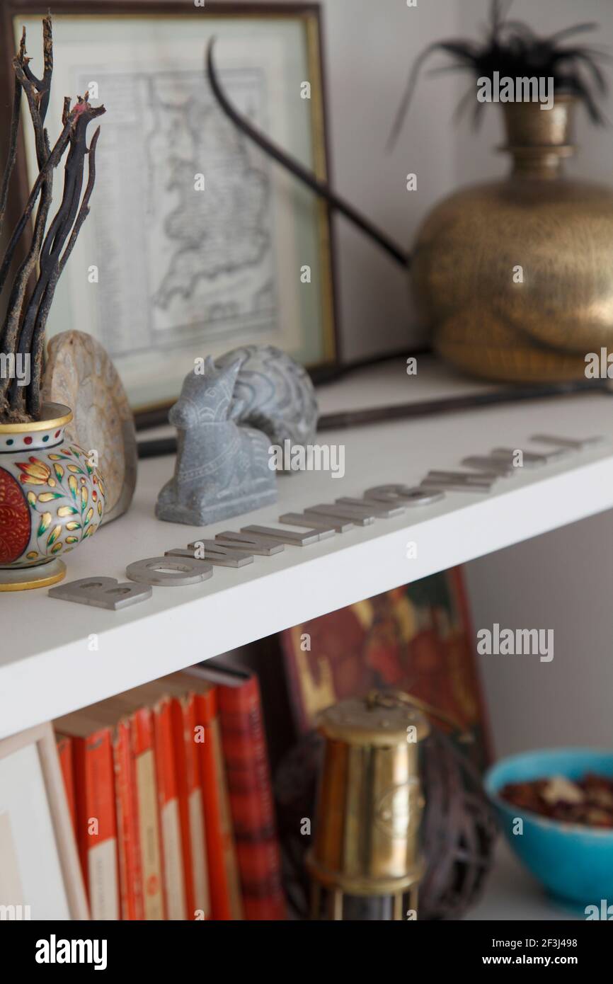 Objects on bookshelves | Architect: Silk Mews Architects | Stock Photo