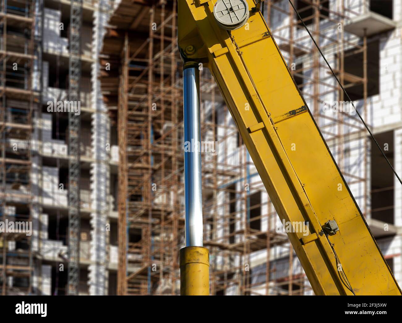 Part of a construction machine (excavator or crane) with multi-storey ...