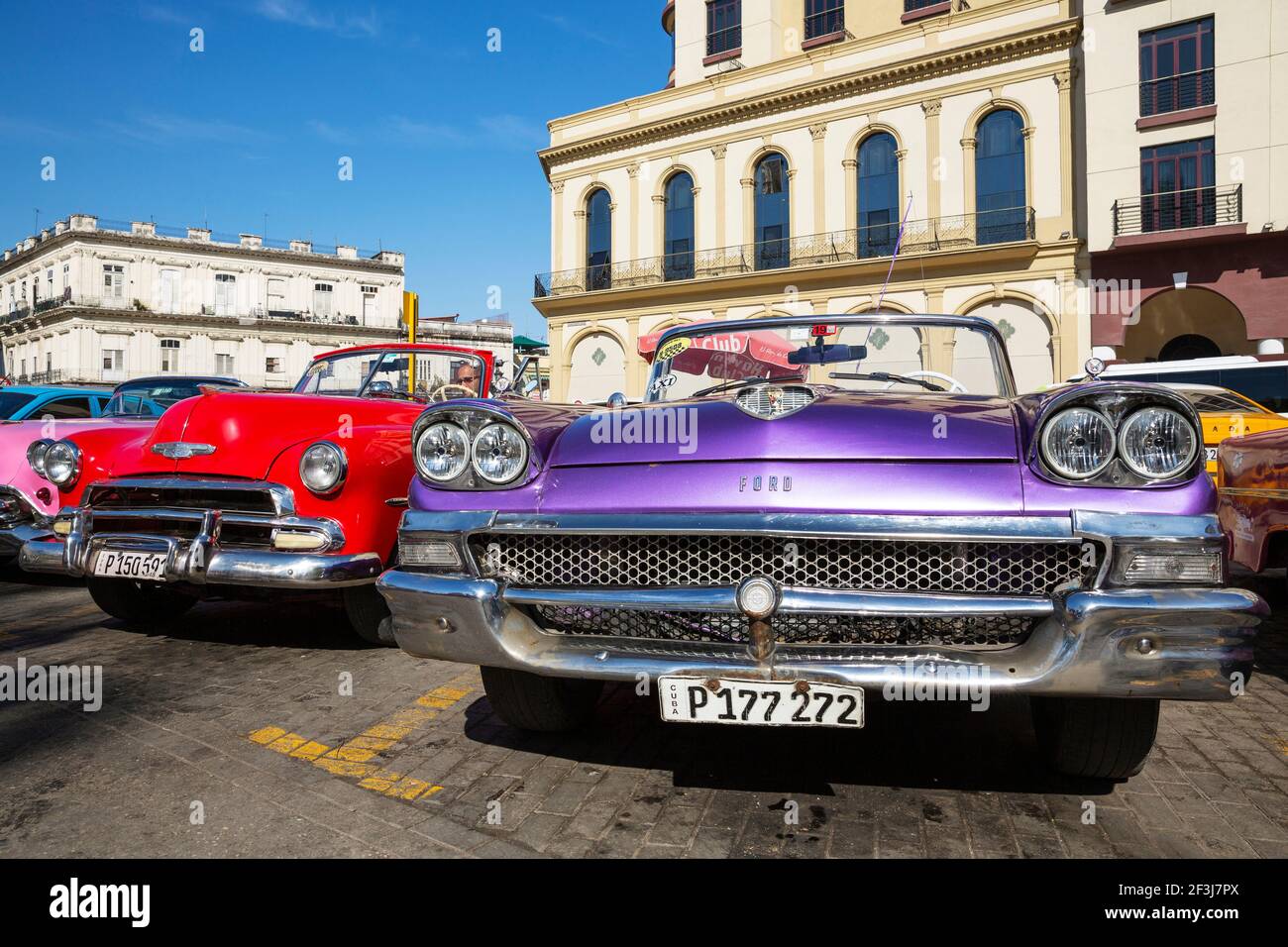 US classic cars from the 1950s can be hired for touristic city tours, Havana, Cuba Stock Photo