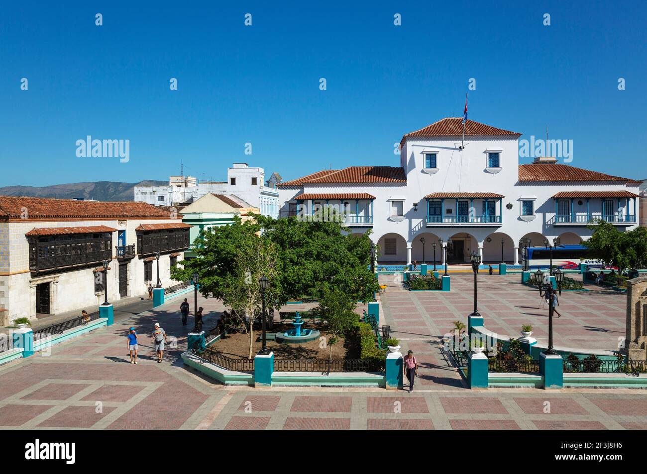 Parque Cespedes with the town hall on the right and the Casa Velazquez on the left, Santiage de Cuba, Cuba Stock Photo