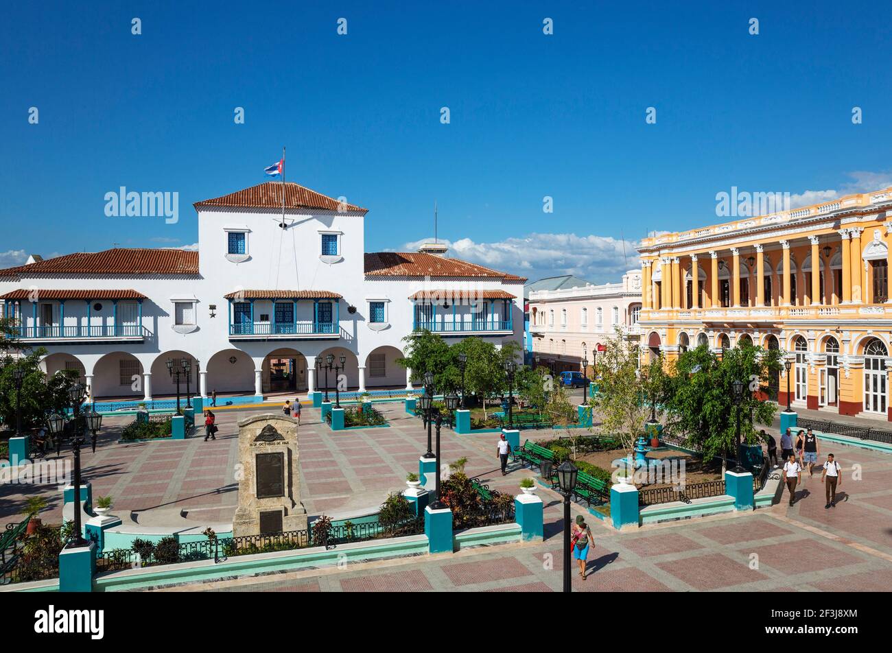 Parque Cespedes with the town hall on the left and the nineteenth-century building of the Casa de la Cultura on the right, Santiago de Cuba, Cuba Stock Photo