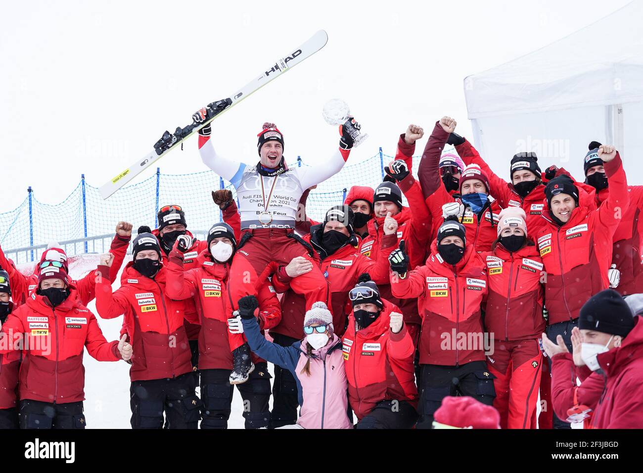 Lenzerheide, Switzerland. 17th Mar, 2021. 17.03.2021, Lenzerheide,  Lenzerheide, Audi FIS Ski World Cup Lenzerheide: Downhill Men, Beat Feuz ( Switzerland) is the overall World Cup winner in Downhill 2021. Photo with Swiss  Ski