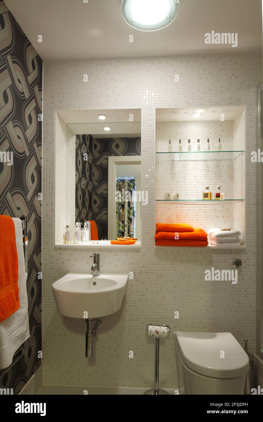 Ensuite bathroom with mosaic tiling and retro wallpaper | | Designer ...