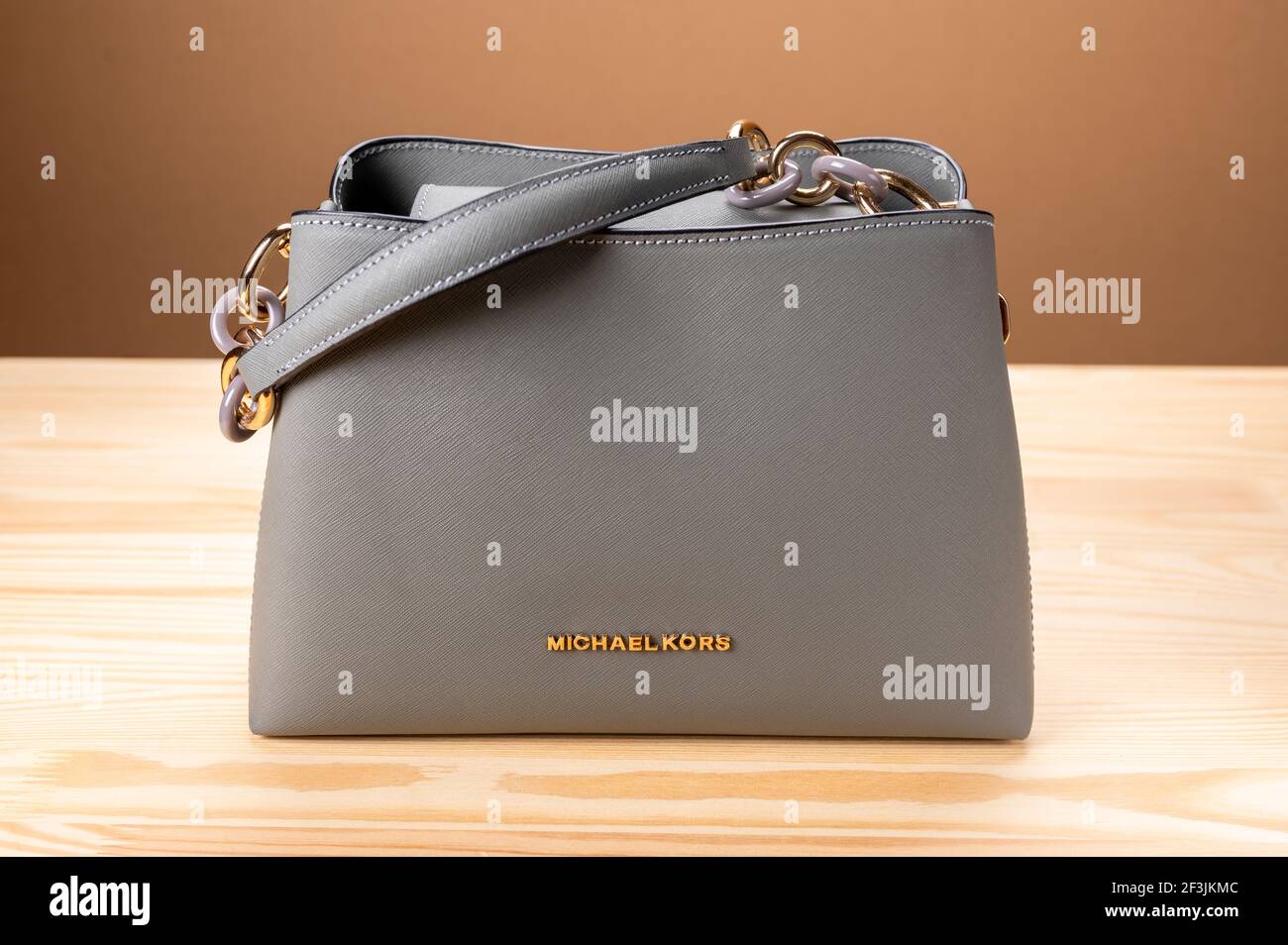MOSCOW, RUSSIA - MARCH, 17, 2021: new model leather grey handbag Michael  Kors on wooden table. Michael Kors brand of clothing, accessories and  perfume Stock Photo - Alamy