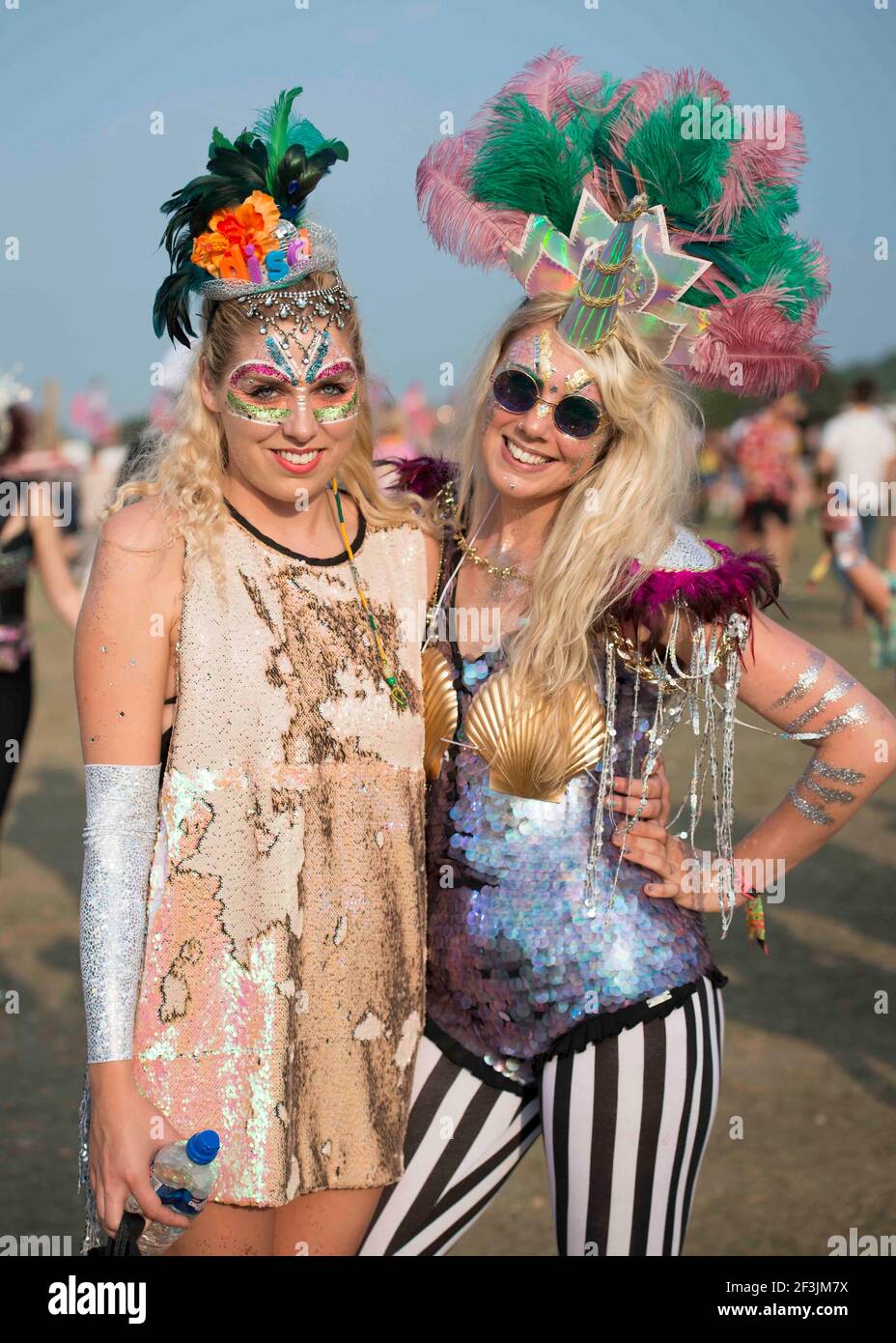 Festival goers in Desert Island Disco themed fancy dress on day 3