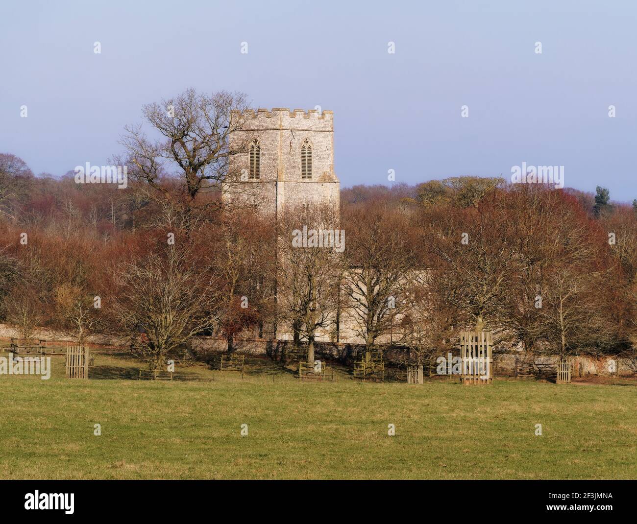 The medieval church of St Margaret's in Felbrigg, Norfolk, stands isolated within the parkland of a stately home since the 16th century plague. Stock Photo