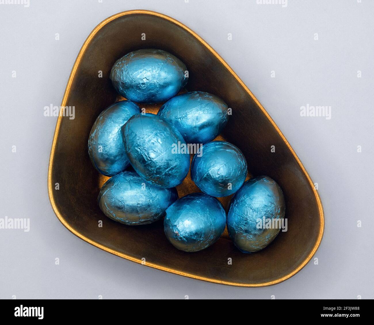 Chocolate Easter eggs in the lacquer bowl Stock Photo