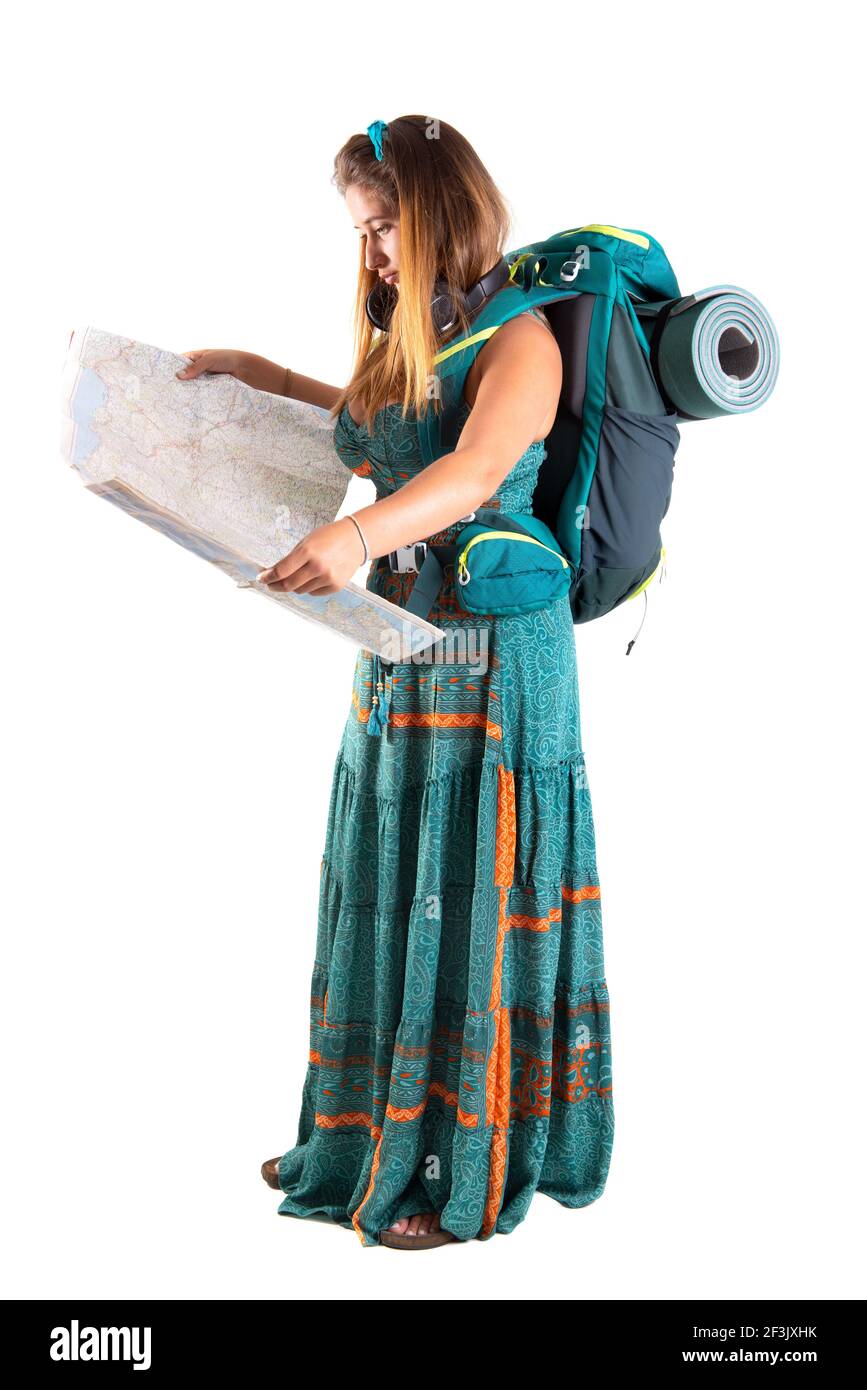 Happy hiker girl with backpack and map, isolated in white, trekking and travel lifestyle concept Stock Photo