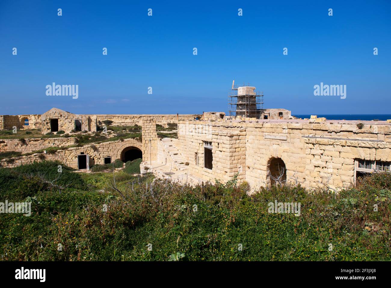 Fragment photos and ruins of Fort Ricasoli which was built by the Order of Saint John between 1670 and 1698,situated in Kalkara, Malta. It is the larg Stock Photo
