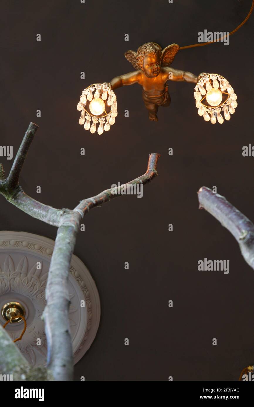 Suspended cherub chandelier viewed from below |  | Designer: Richard Brett / We Like Today Stock Photo