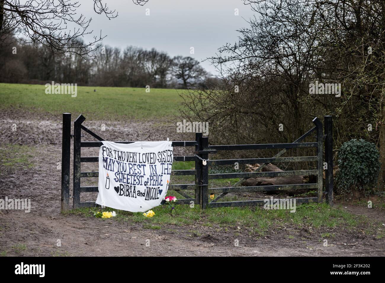 Fryent Park, Wembley Park, UK. 17th March 2021.  As we focus on the murder of Sarah Everard, Alina Wahab and Fawwaz Noibi have set up a memorial to two sisters murdered last June.   The bodies of Nicole Smallman, 27, and Bibaa Henry, 46, were found in Fryent Park in Wembley on 7 June, two days after they went missing following a birthday party in the park.   13 Metropolitan Police officers were suspended for sharing inappropriate images, including selfies of themselves with the sisters bodies, via WhatsApp, but have still not been charged.  Amanda Rose/Alamy Live News Stock Photo