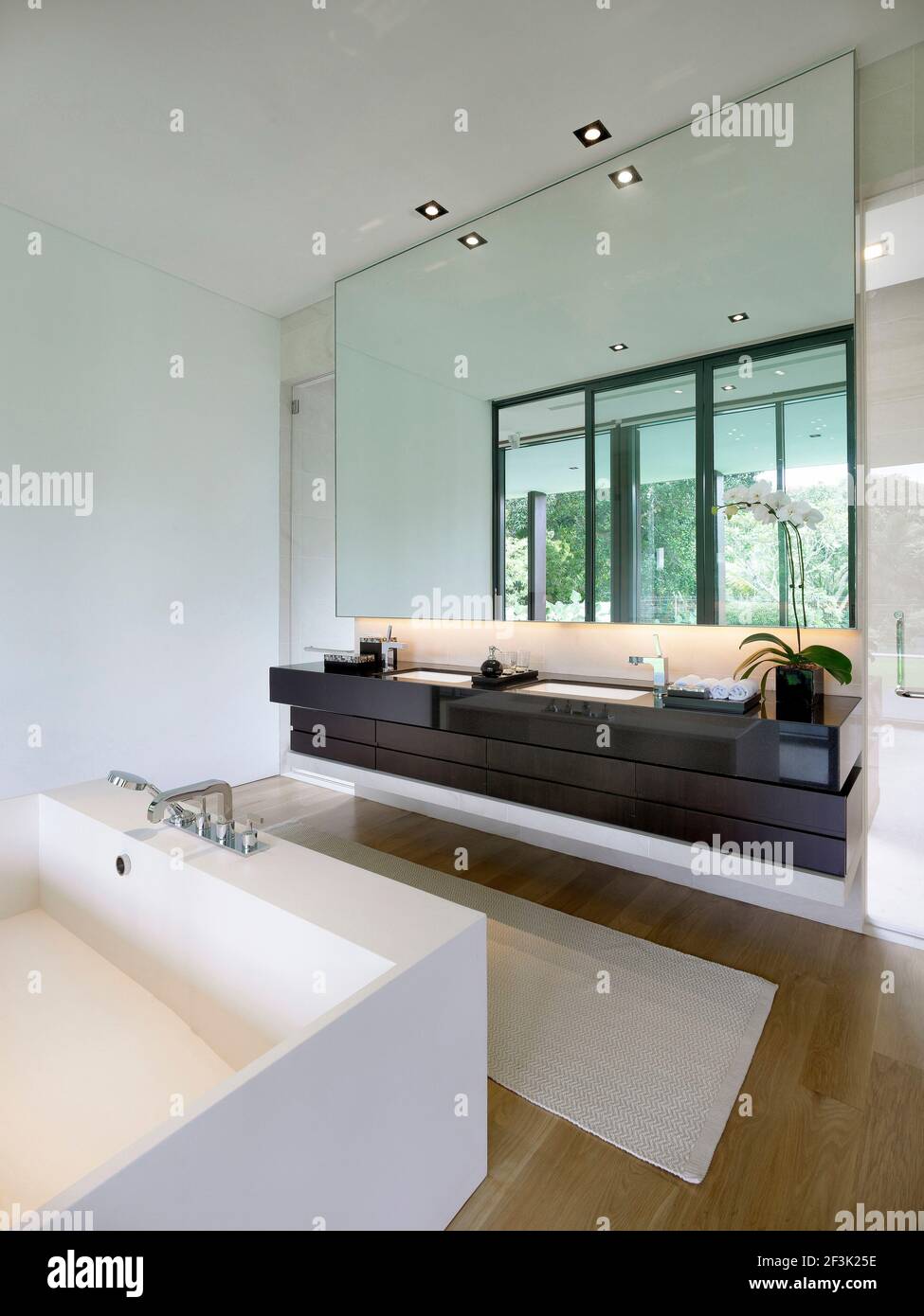 Mirror above washbasins in modern bathroom, 9 Ridout Rd, Singapore Stock Photo