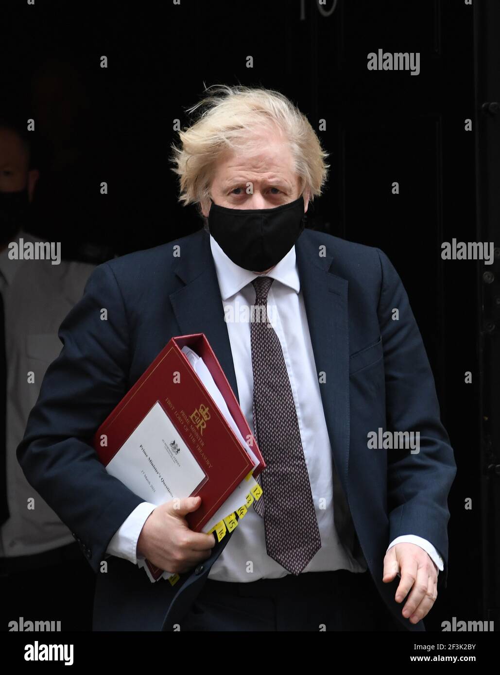 Prime Minister Boris Johnson leaves 10 Downing Street to attend Prime Minister's Questions at the Houses of Parliament, London. Picture date: Wednesday March 17, 2021. Stock Photo