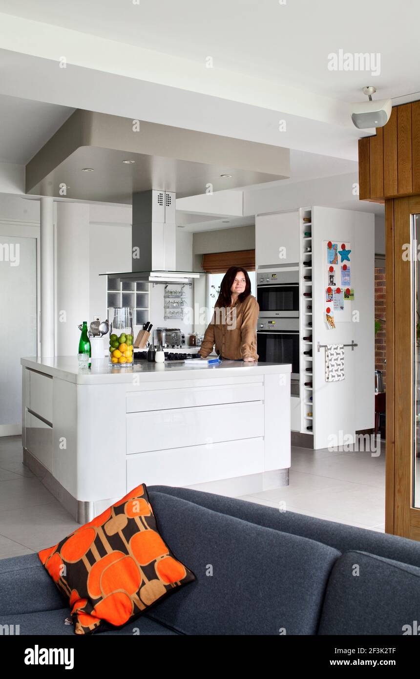 Kitchen with owner. High House. Architect Paul Archer Design Stock Photo Alamy