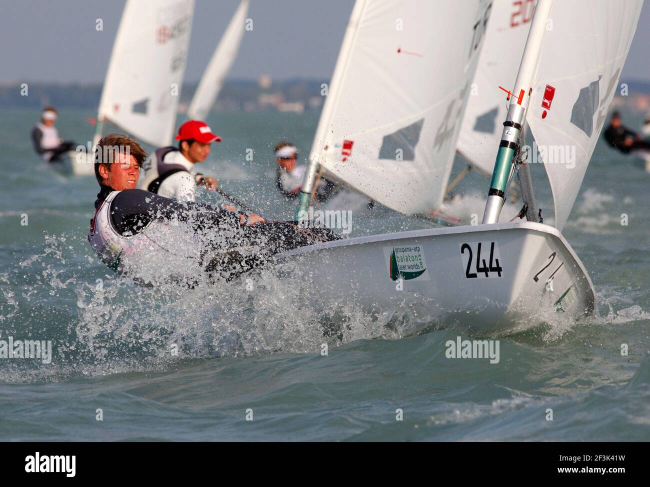 Sailing - Groupama - OTP Balaton Laser Worlds 2013 - Laser 4.7 Youth World  and European Championships - HUNGARY - 06-13/07/2013 - Photo Gabor Turcsi /  DPPI - U18 - Romas Ovcinnikov (LTU Stock Photo - Alamy