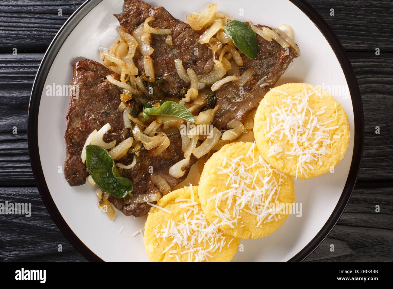 Liver With Onions Sage And Vinegar Fegato Alla Veneziana With Polenta Closeup In The Plate On The Table Horizontal Top View From Above Stock Photo Alamy