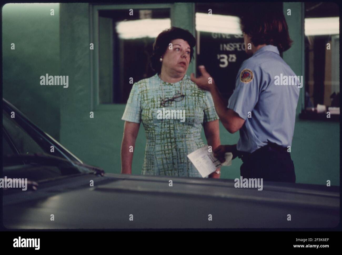 Public Works Department Employee at an Auto Emission Inspection Station in Norwood, Ohio...08