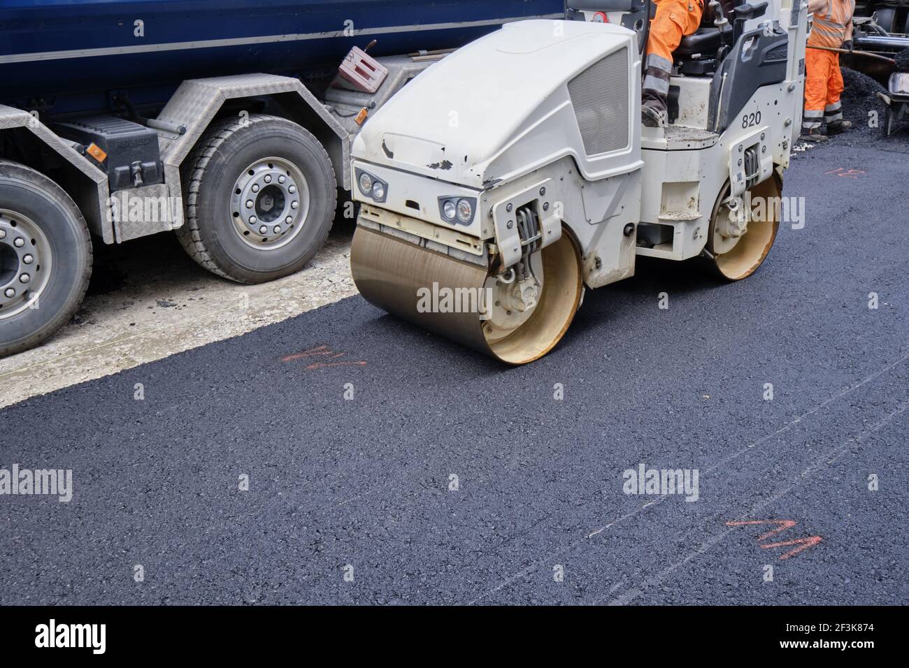 Paving the road with porous asphalt for traffic noise reduction in Geneva,  switzerland Stock Photo - Alamy