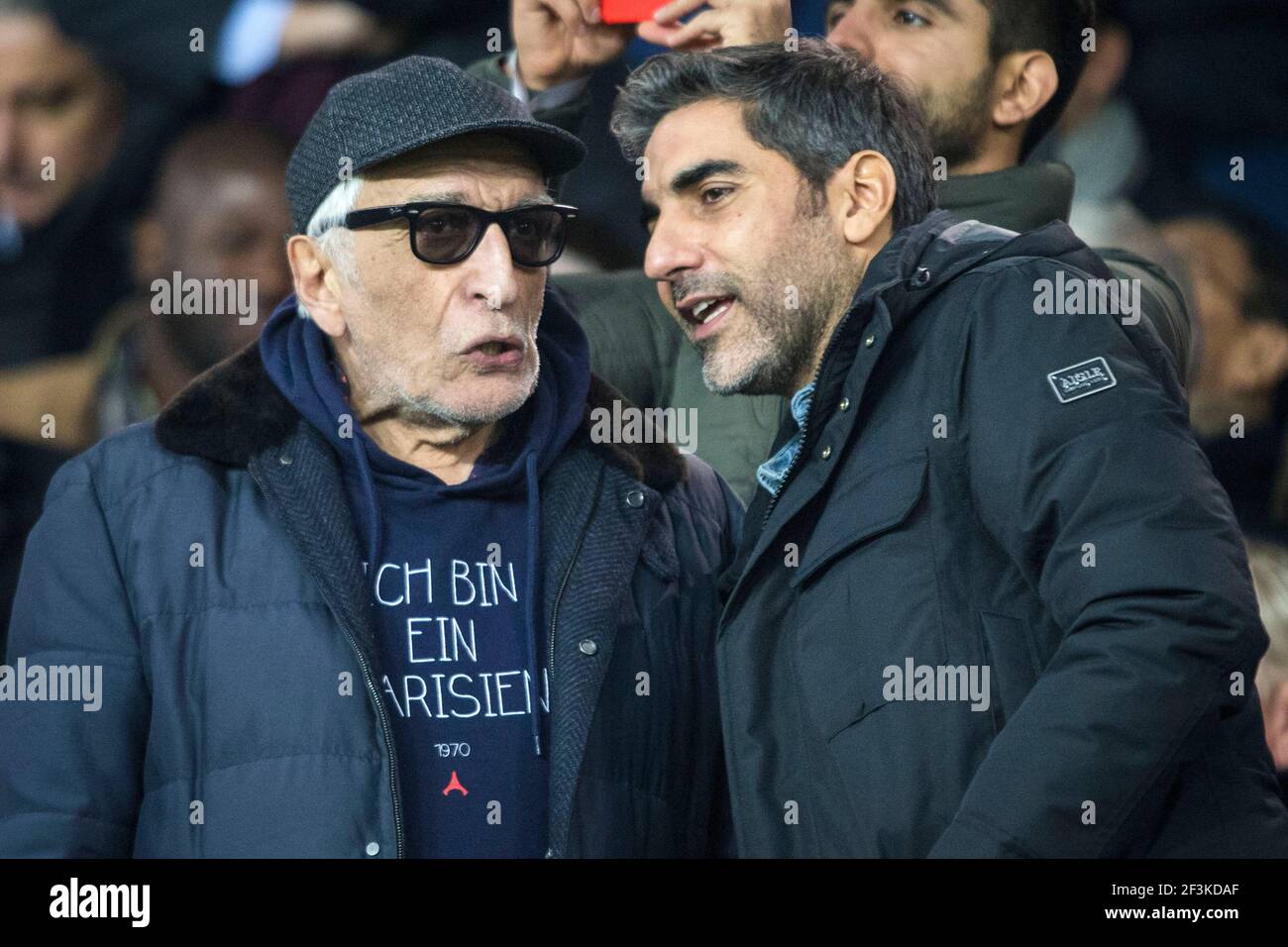 French actor and comedian Ary Abittan (R) is seen talking to French actor Gerard Darmon (L) during the UEFA Champions League, Group B, football match between Paris Saint-Germain and RSC Anderlecht on October 31, 2017 at Parc des Princes stadium in Paris, France - Photo Geoffroy Van Der Hasselt / DPPI Stock Photo